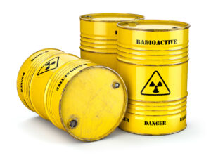 Barrels with radioactive waste isolated on white, Manufacturing of nuclear power and utilization of radioctive materials. 3d illustration